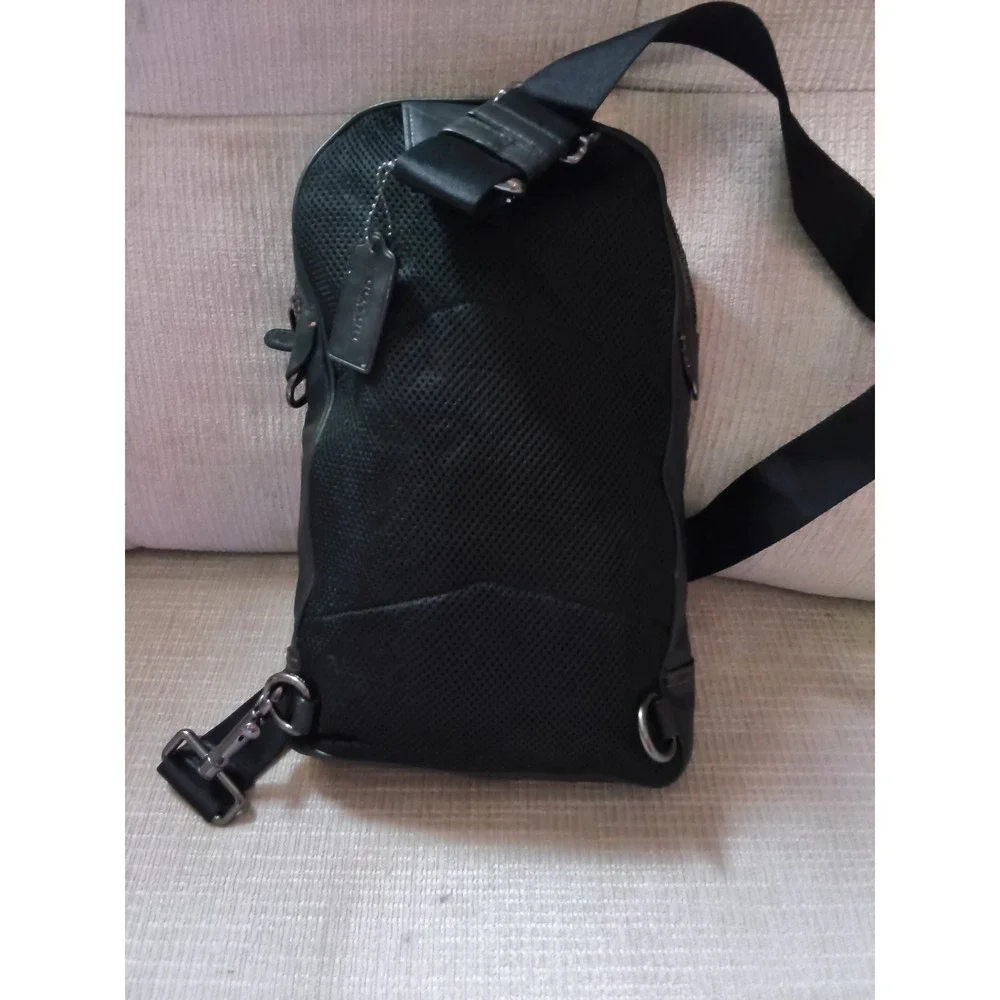26. Coach Charles Pack Black Leather Sling Crossbody Bag F37598
